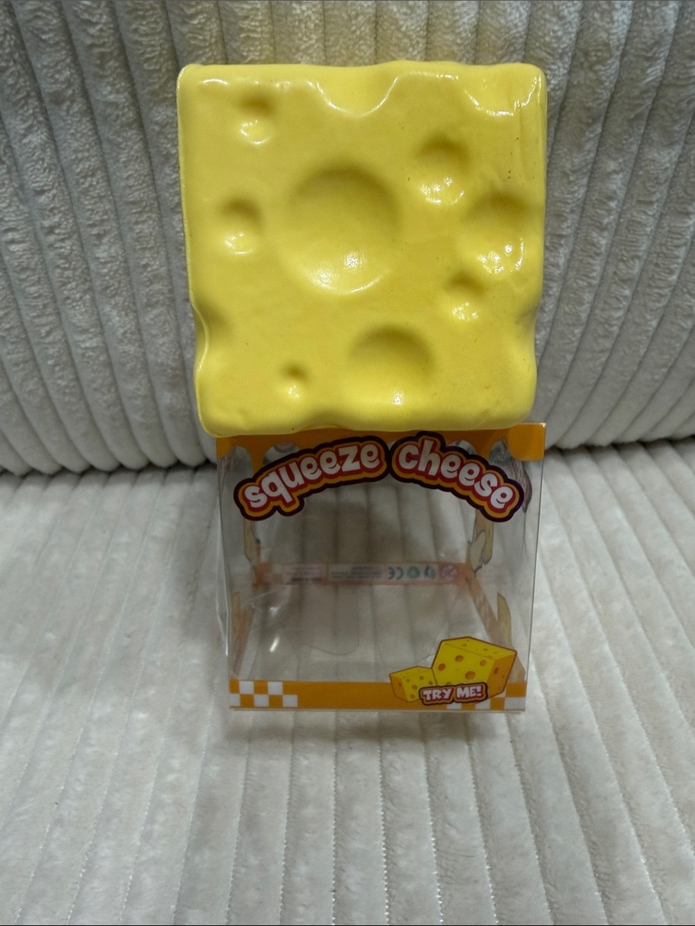Squeeze Cheese Squishy - foam texture and scented. New in package.